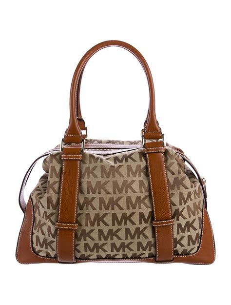 michael kors monogramed shoulder bag|Michael Kors monogram wallet.